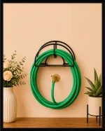 Garden Hose Holder Pakistan mounted on the outdoor garden wall