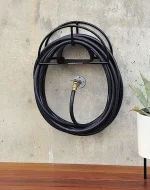 Garden Hose Holder Pakistan mounted on the outdoor garden wall