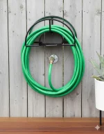 Garden Hose Holder Pakistan mounted on the outdoor garden wall