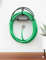 Garden Hose Holder Pakistan mounted on the outdoor garden wall